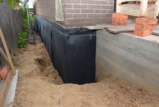 SJ Waterproofing Pros technician performing targeted Waterproofing assessment in Marietta, GA